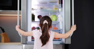 Girl Opening Fridge Door